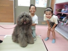 犬とのスリーショットの写真